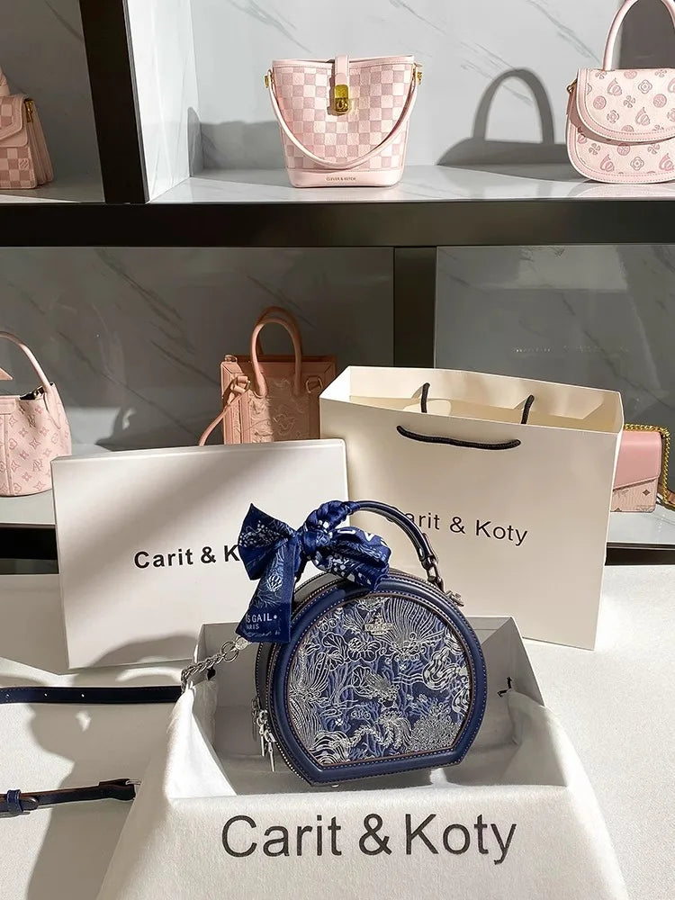 Mini Sac Rond Brodé – Bleu Élégant