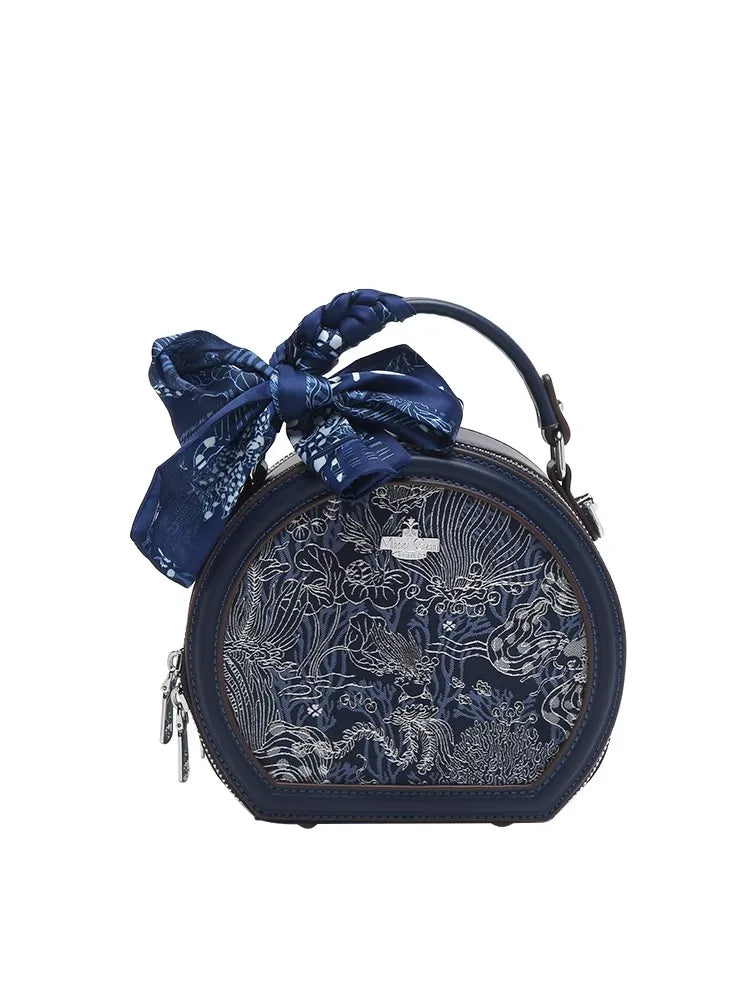 Mini Sac Rond Brodé – Bleu Élégant